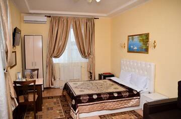 Фото номер Александрия-Домодедово Улучшенный номер с кроватью размера "king-size"